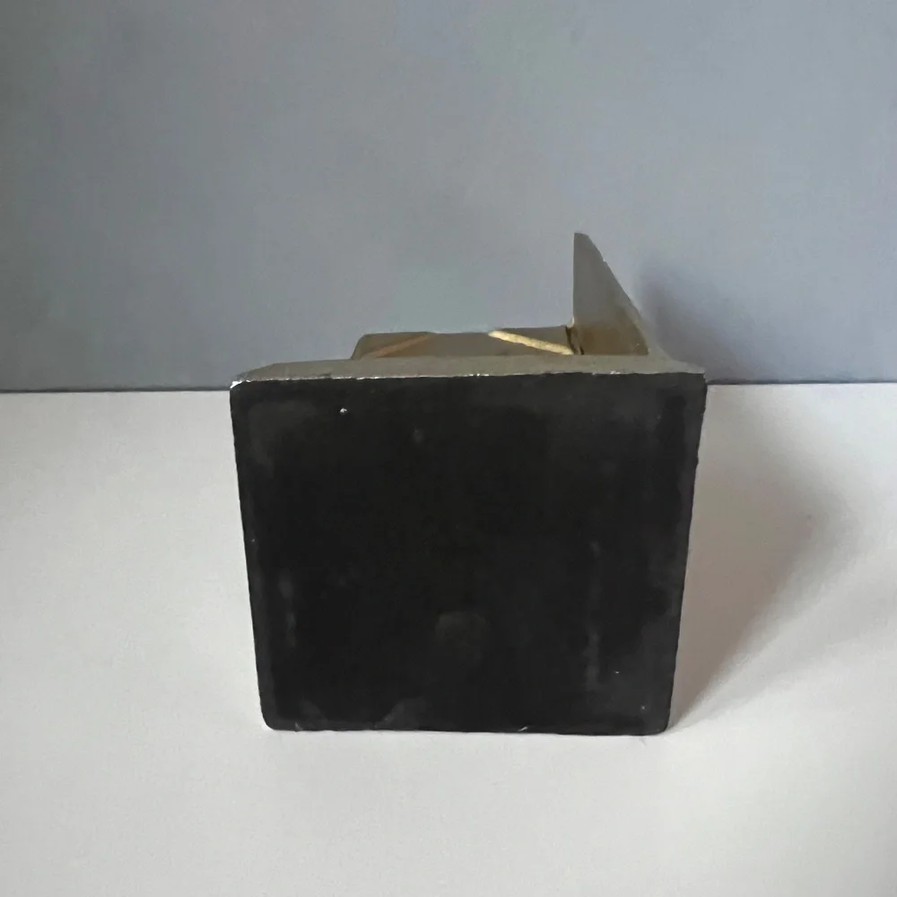 West Elm sculptural bookend in textured antique gold finish.